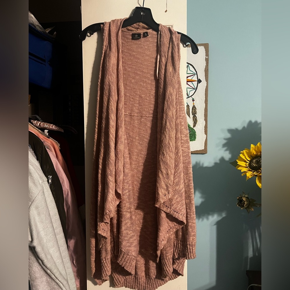 Sleeveless, dark pink cardigan. Size M